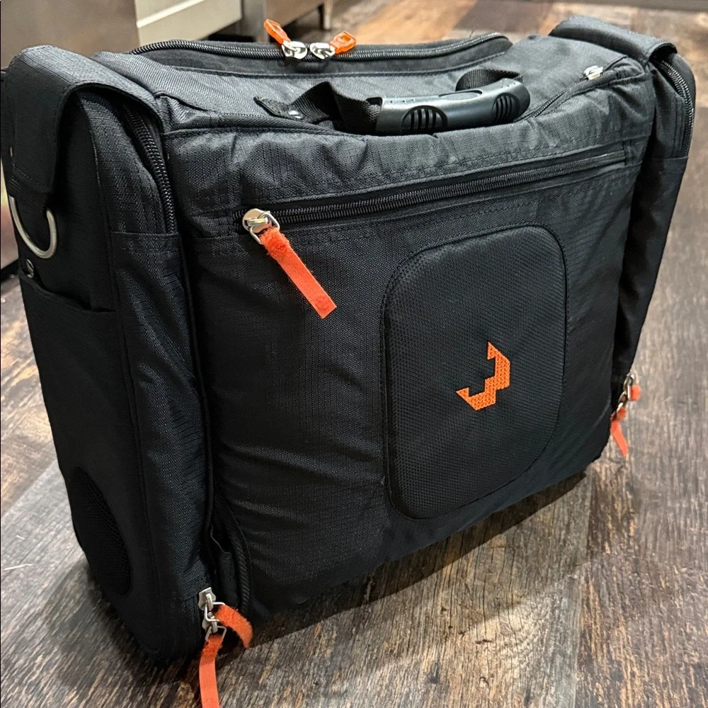 Stylish Spy Optic Inc. Black and Orange Bag/Backpack.